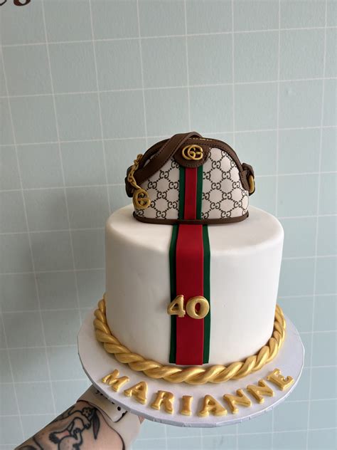 gateau gucci|black Gucci bag cake.